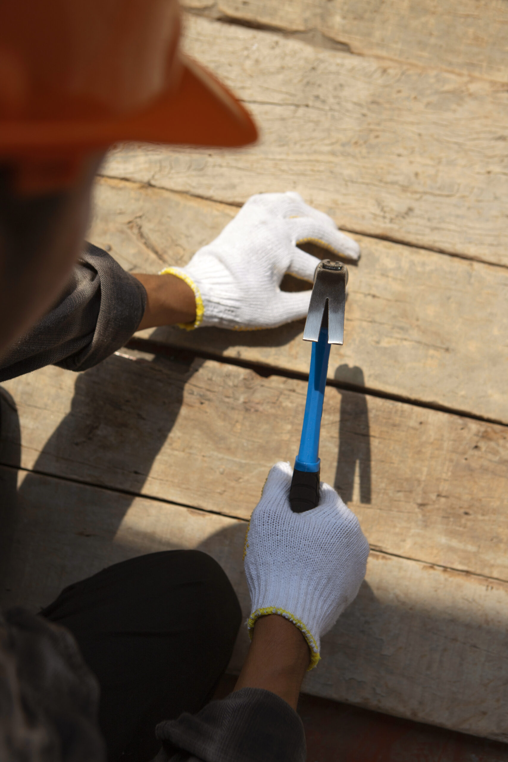 construction-worker-using-hammer-job-site